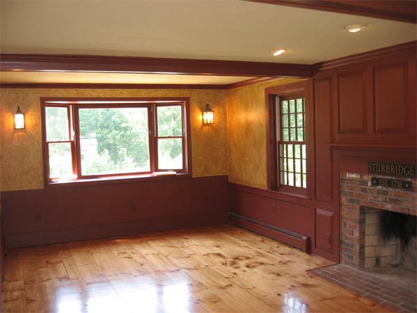 333 New Boston Road Sturbridge, MA 01566 - Photo 4 of 24 a view of an empty room with a fireplace and a window