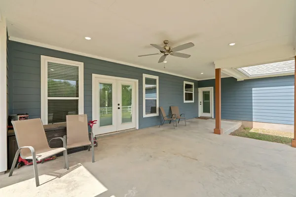 a view of a backyard with a flat screen tv