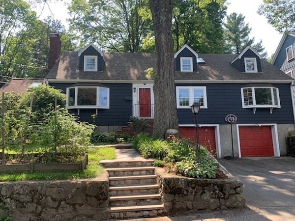 139 Simonds Road Lexington, MA 02420 - Photo 1 of 28 a front view of a house with a yard