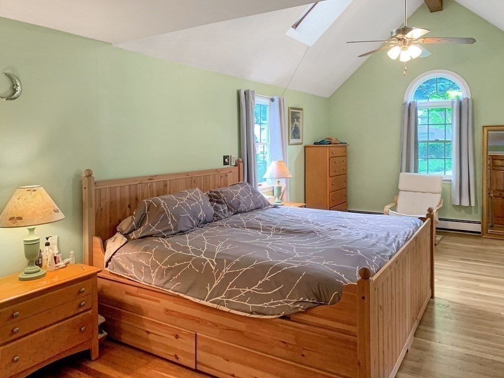 139 Simonds Road Lexington, MA 02420 - Photo 12 of 28 a bedroom with a bed and window