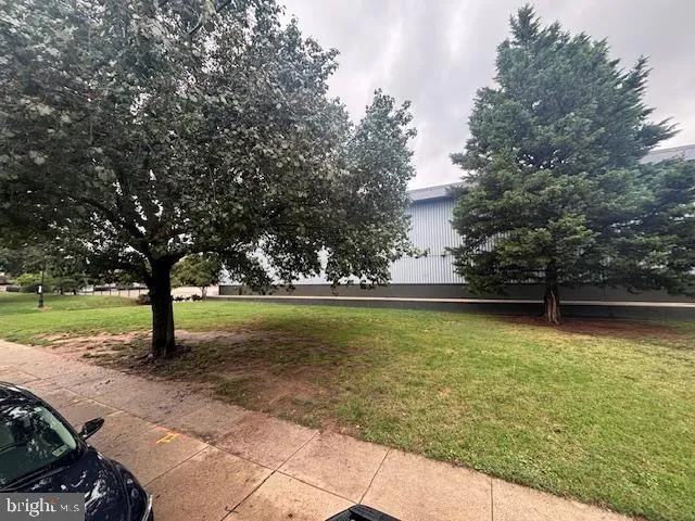 a bathroom with a shower and a sink