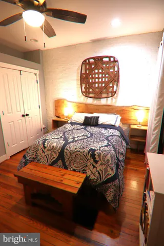 a kitchen with stainless steel appliances granite countertop a refrigerator sink and cabinets