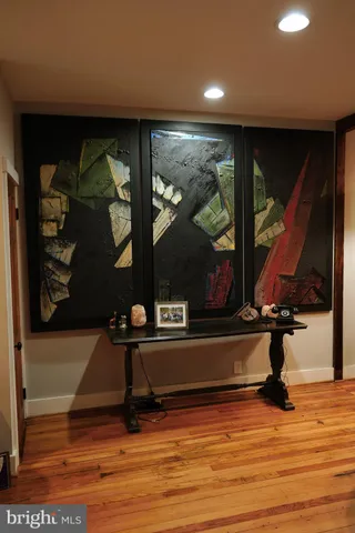 a view of kitchen with furniture and a fireplace