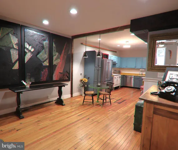 a bathroom with a shower and a sink