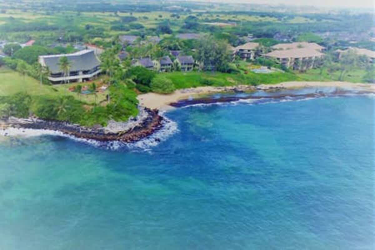 366 Papaloa Road, Unit 114 Kapaa, HI 96746 - Photo 22 of 23 an aerial view of a house with garden space and street view