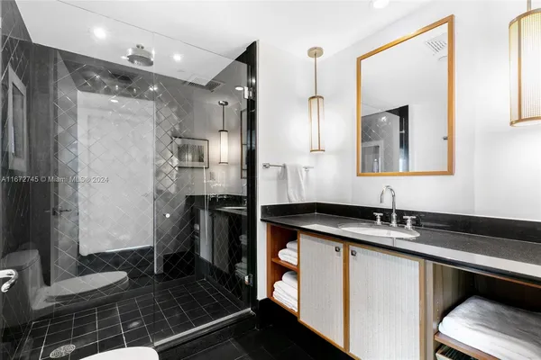a view of a hallway with washer and dryer