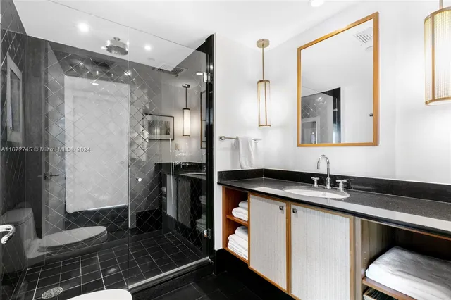 a view of a hallway with washer and dryer