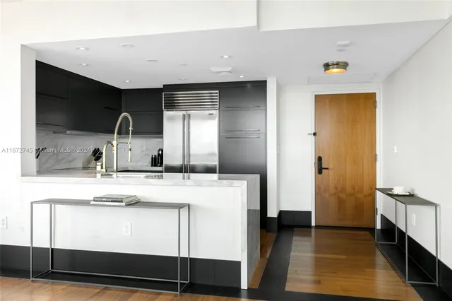 a view of living room with furniture and flat screen tv
