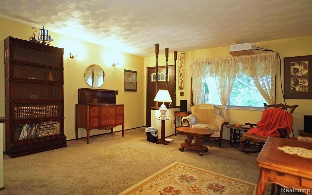5886 Stow Road Fowlerville, MI 48836 - Photo 2 of 20 Adorable living room with large window.