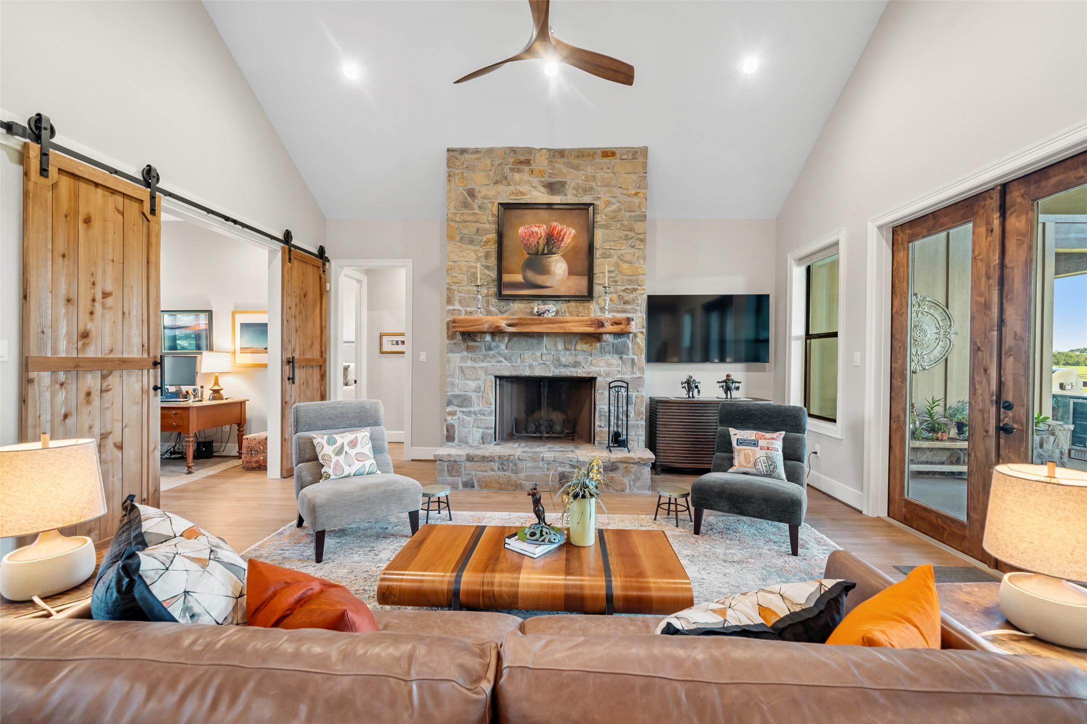 30163 High Spirit Ranch Road Hempstead, TX 77445 - Photo 11 of 49 a living room with furniture fireplace and a large window