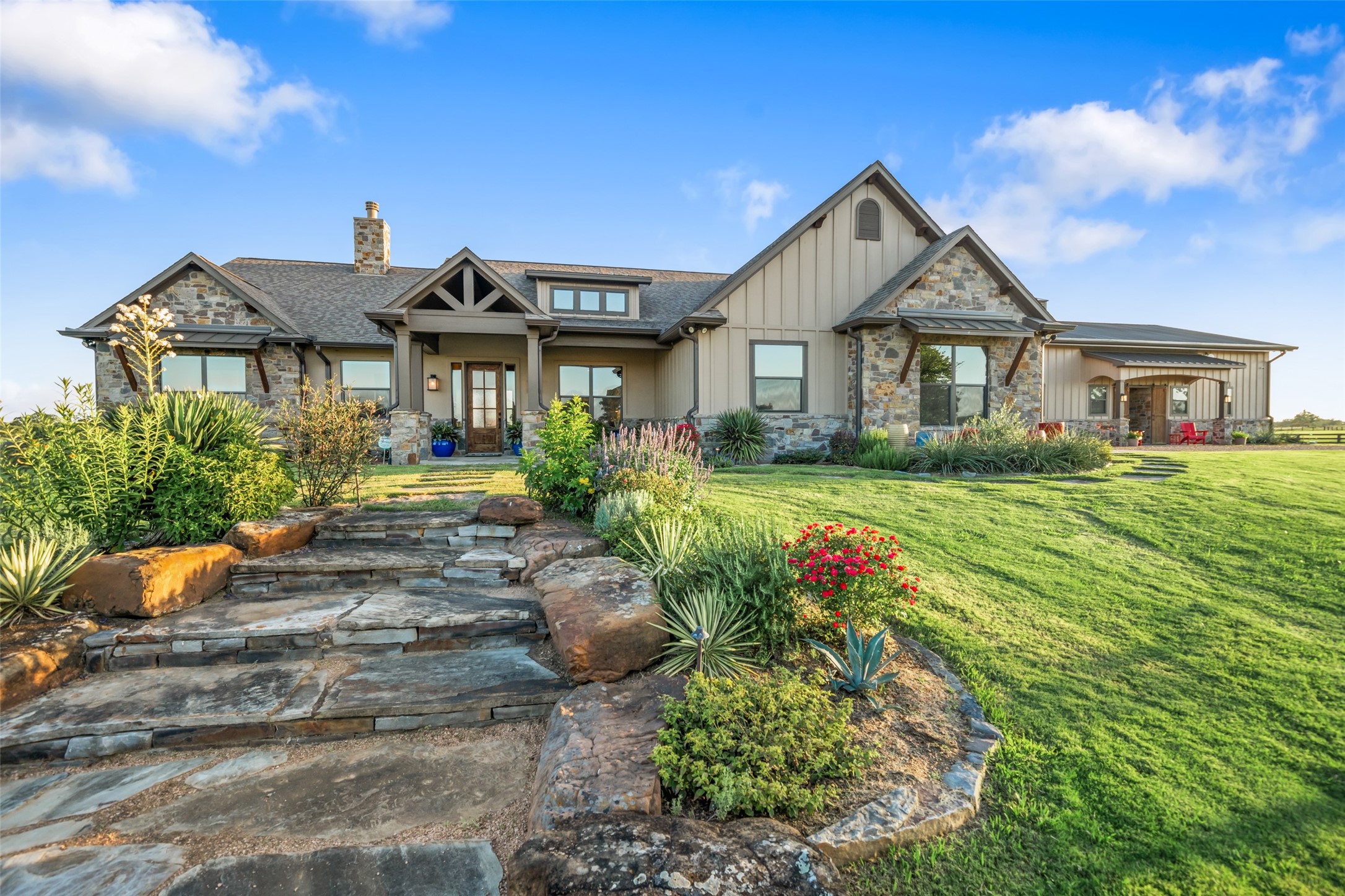 30163 High Spirit Ranch Road Hempstead, TX 77445 - Photo 49 of 49 a front view of a house with garden