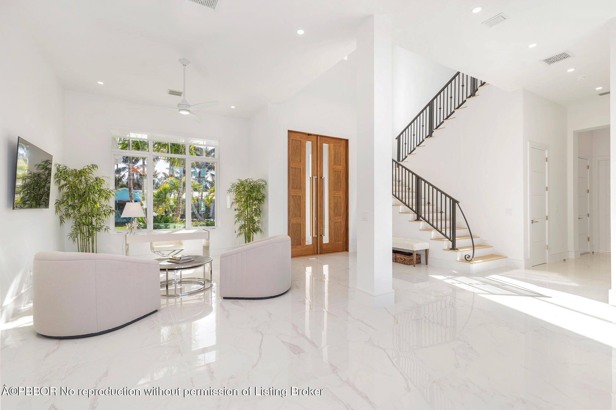 1180 Bimini Lane Riviera Beach, FL 33404 - Photo 5 of 35 a living room with furniture and a large window