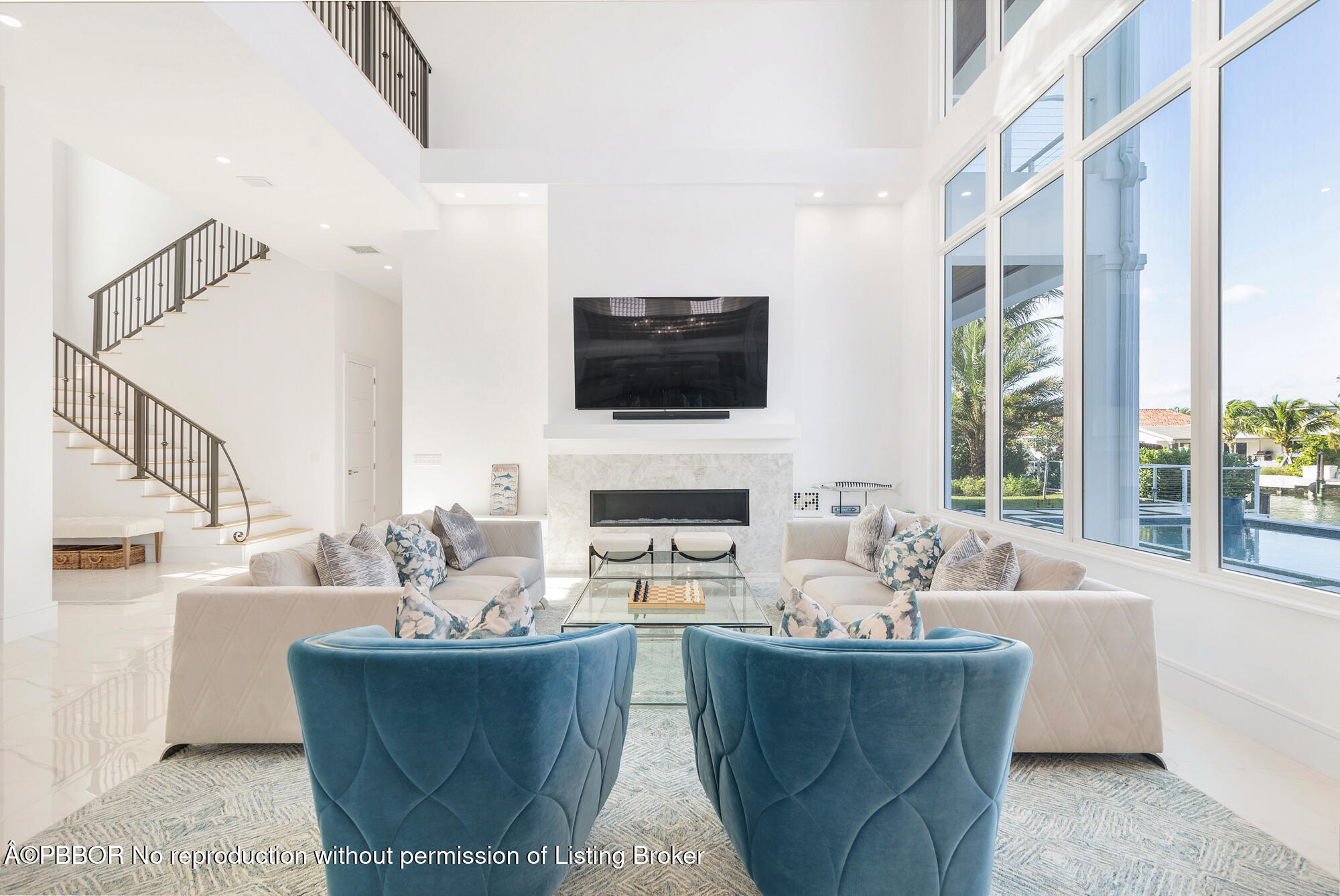 1180 Bimini Lane Riviera Beach, FL 33404 - Photo 7 of 35 a living room with fireplace furniture and a flat screen tv