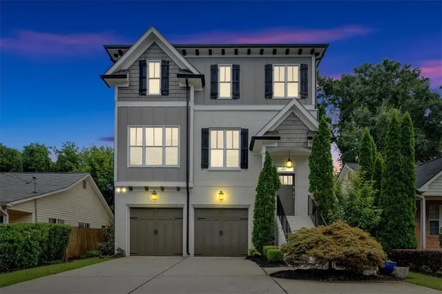 a view of entryway with wooden floor and stairs
