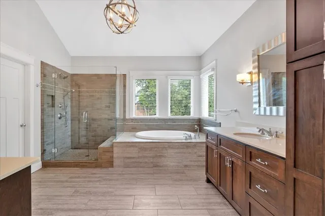 wooden view of walk in closet with empty racks