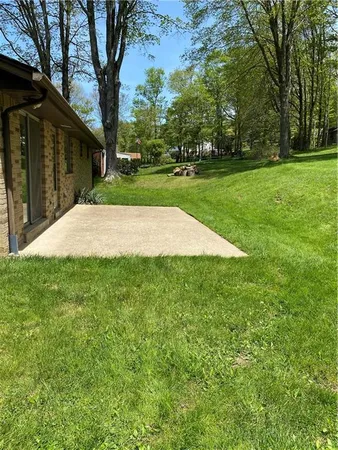 a view of a backyard with green space