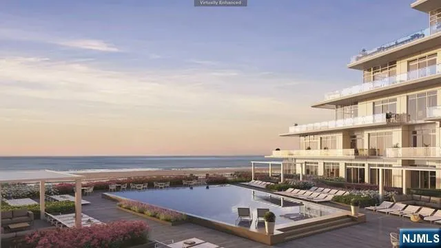 an aerial view of a swimming pool and lake view