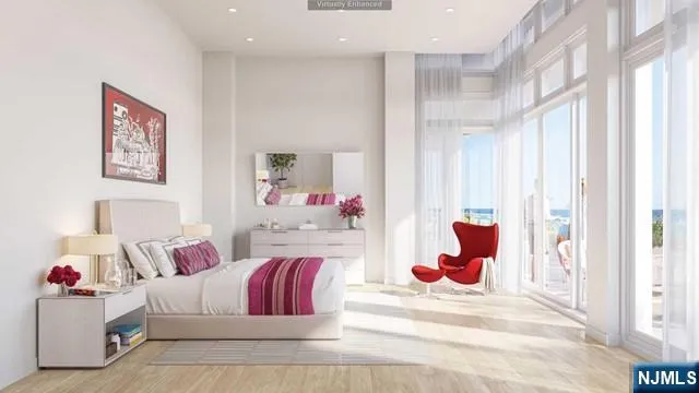 a bedroom with a bed and a couch