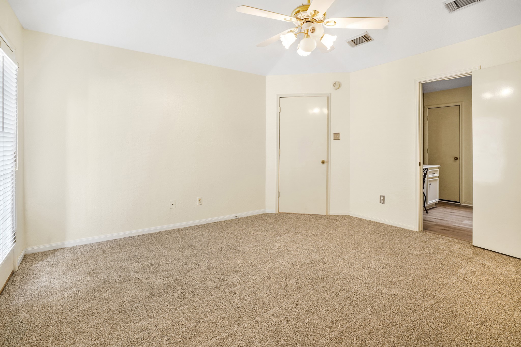 50 Evanston Street, Unit 3 Houston, TX 77015 - Photo 12 of 21 an empty room with a chandelier fan and closet