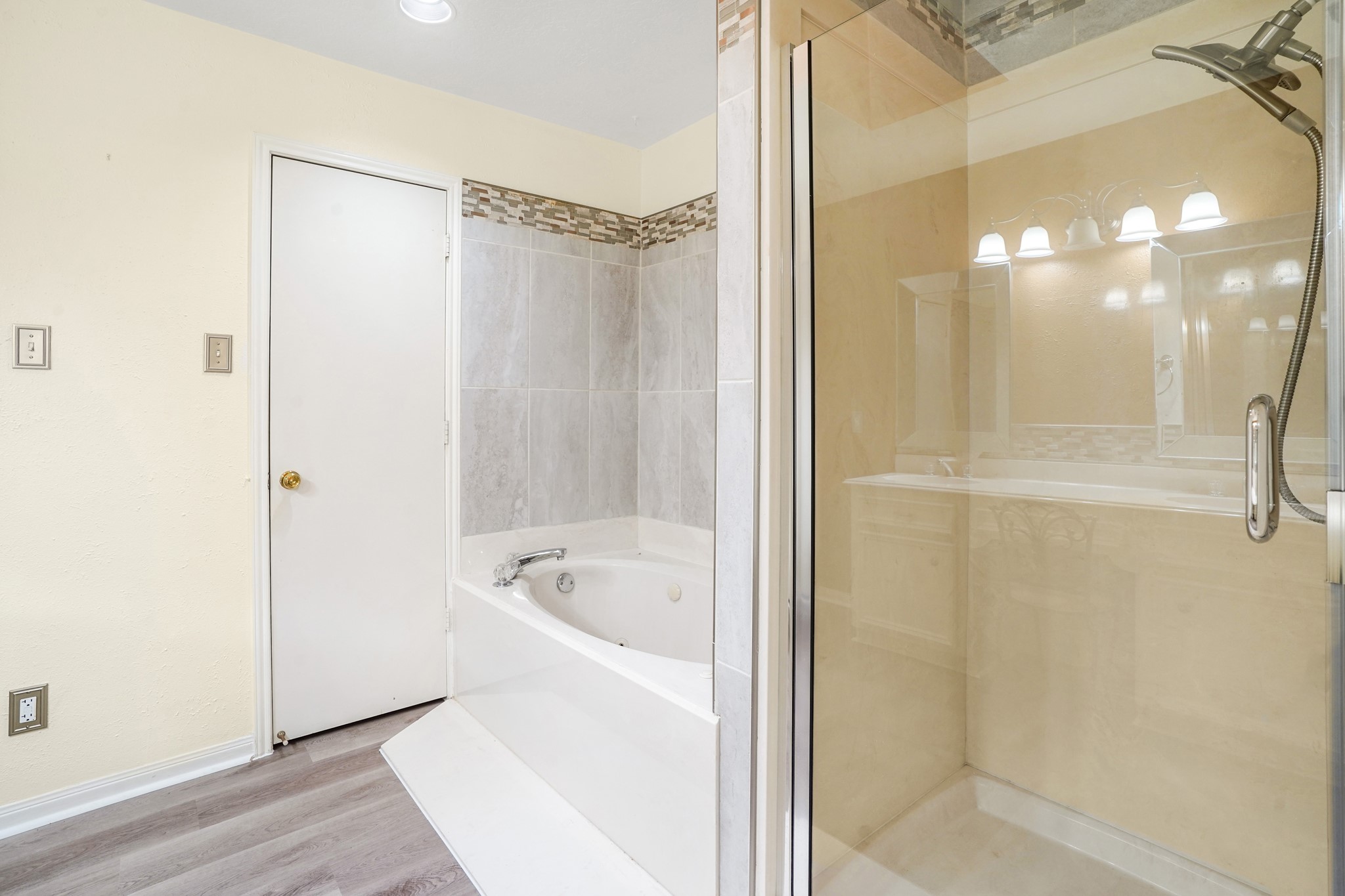 50 Evanston Street, Unit 3 Houston, TX 77015 - Photo 15 of 21 a bathroom with a bathtub and a shower