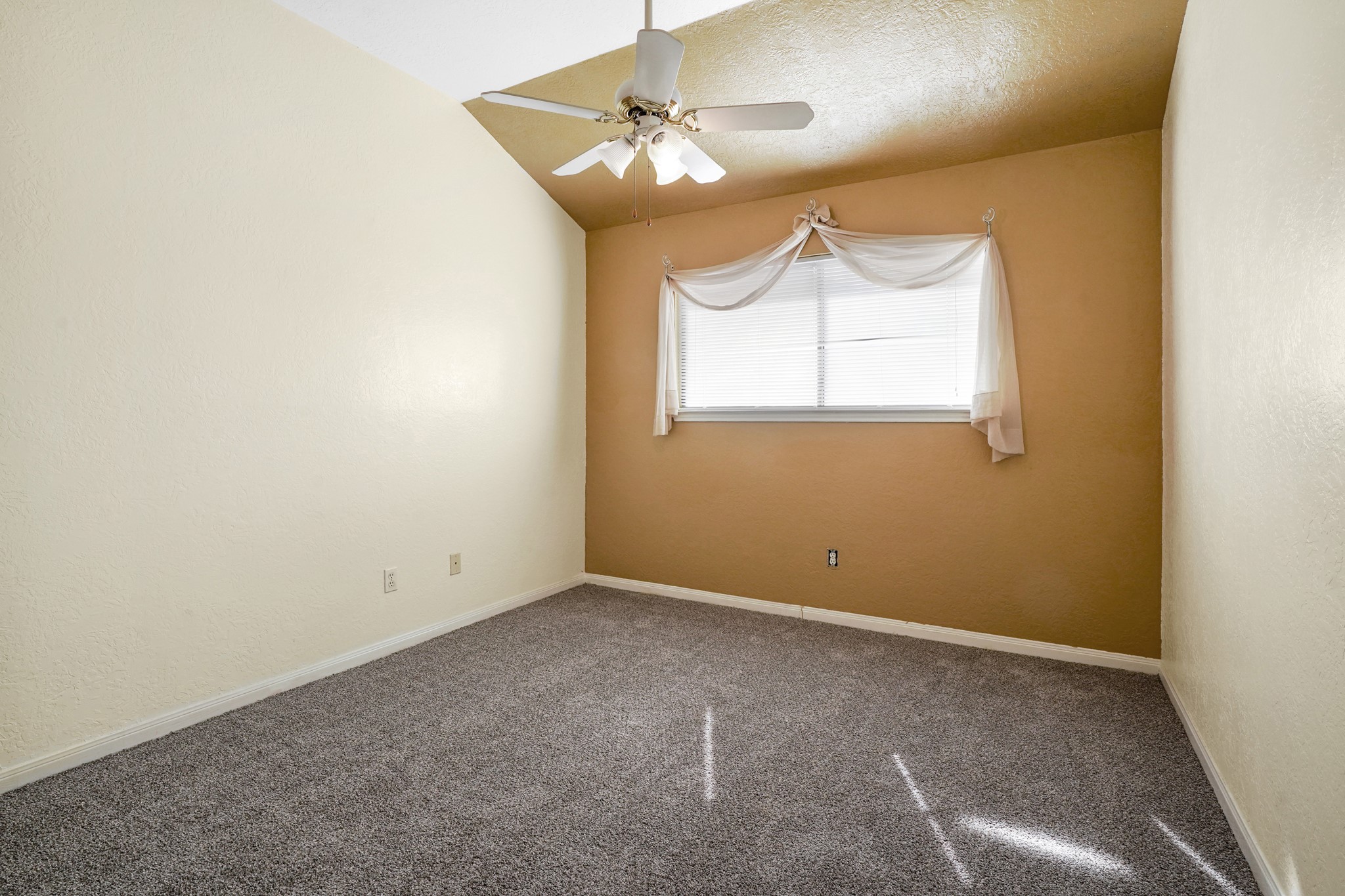 50 Evanston Street, Unit 3 Houston, TX 77015 - Photo 16 of 21 an empty room with a window and a ceiling fan