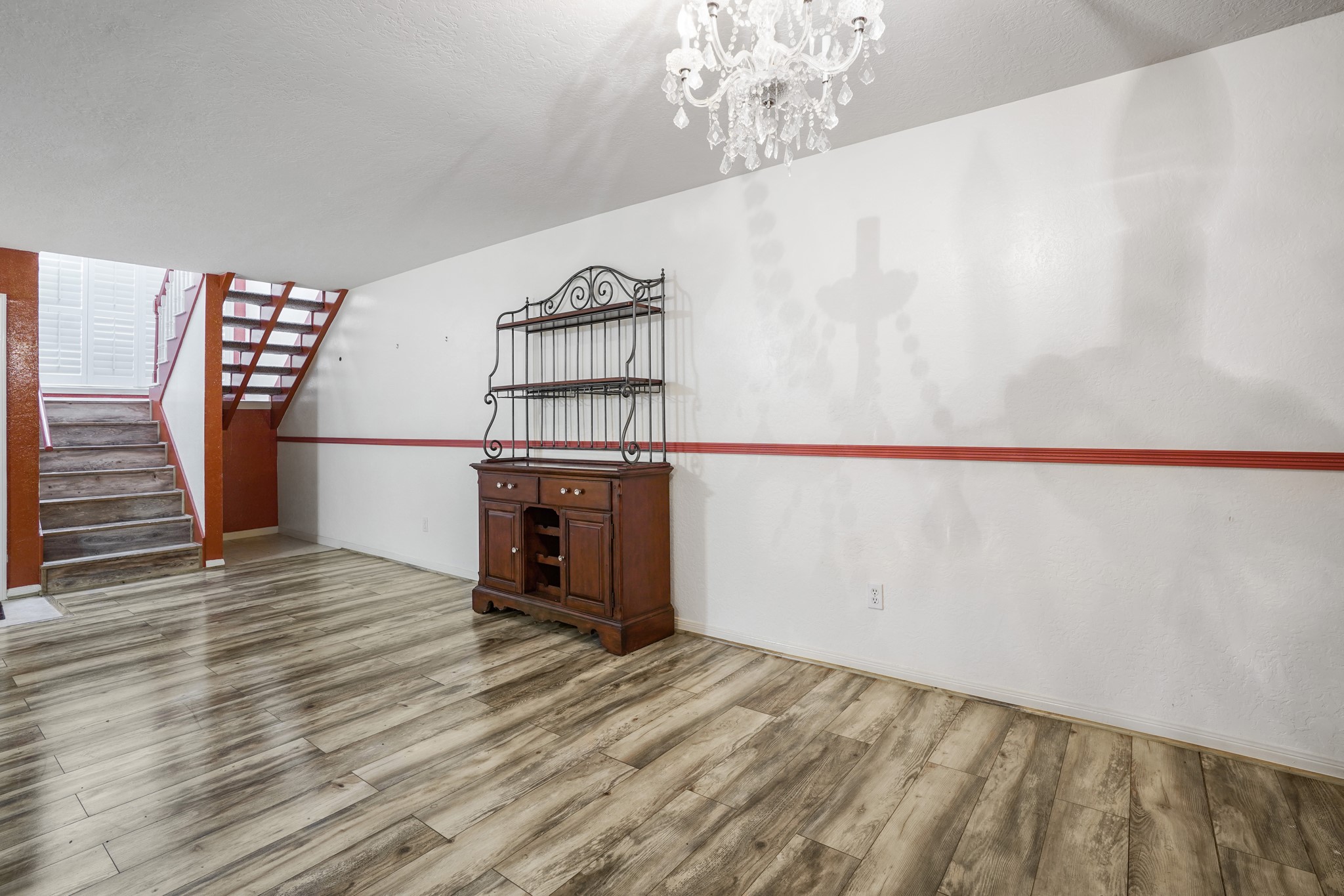 50 Evanston Street, Unit 3 Houston, TX 77015 - Photo 6 of 21 a view of a livingroom with wooden floor and staircase