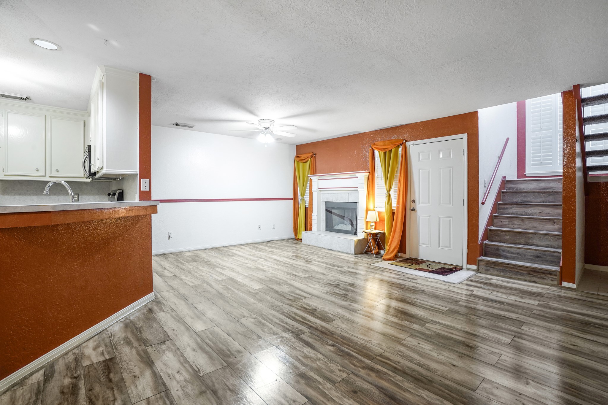 50 Evanston Street, Unit 3 Houston, TX 77015 - Photo 7 of 21 a view of a room with wooden floor and stairs