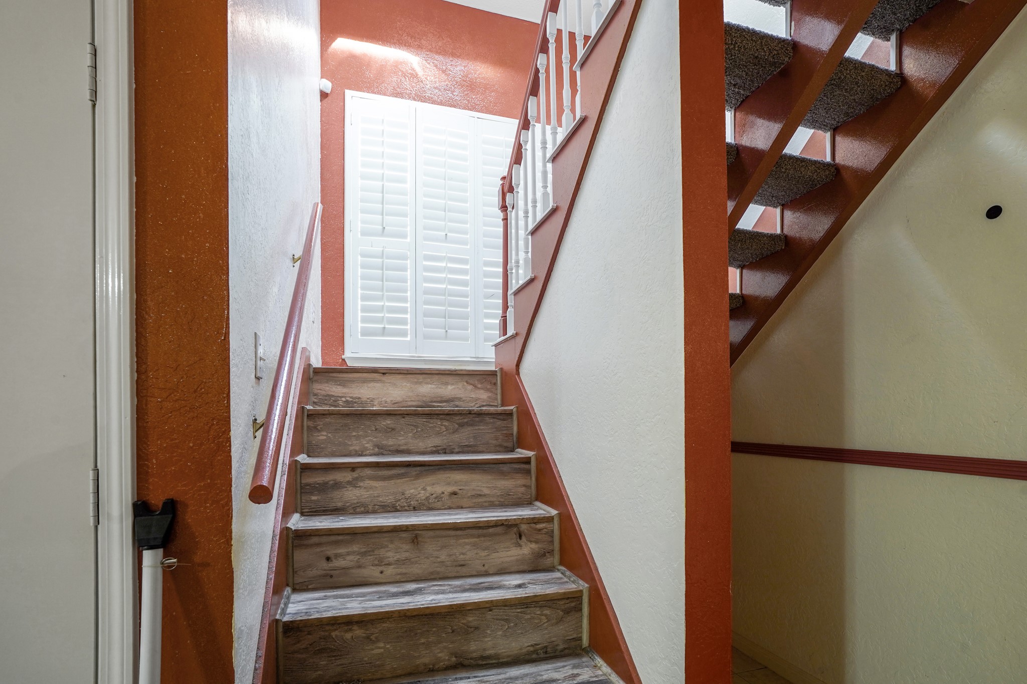 50 Evanston Street, Unit 3 Houston, TX 77015 - Photo 9 of 21 a view of staircase with wooden floor and white walls