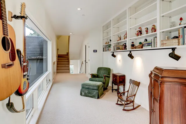 a view of kitchen with cabinets and appliances