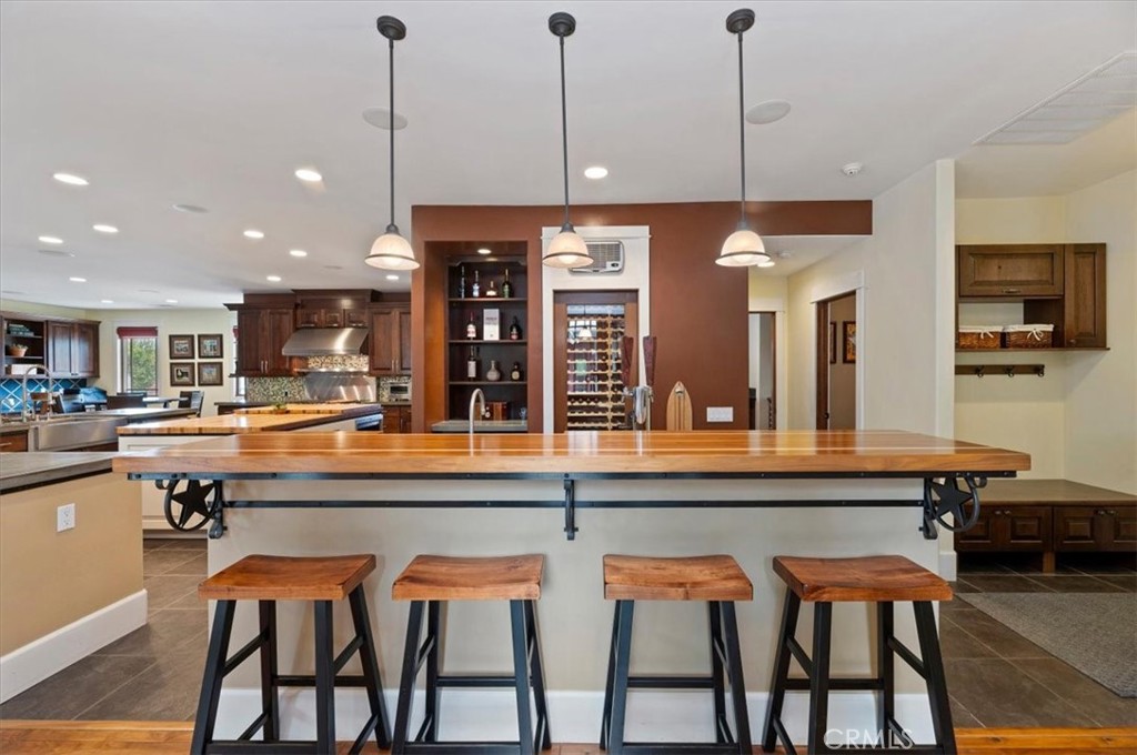 16420 Rocky Glen Road Perris, CA 92570 - Photo 16 of 74 Bar looking into wine room