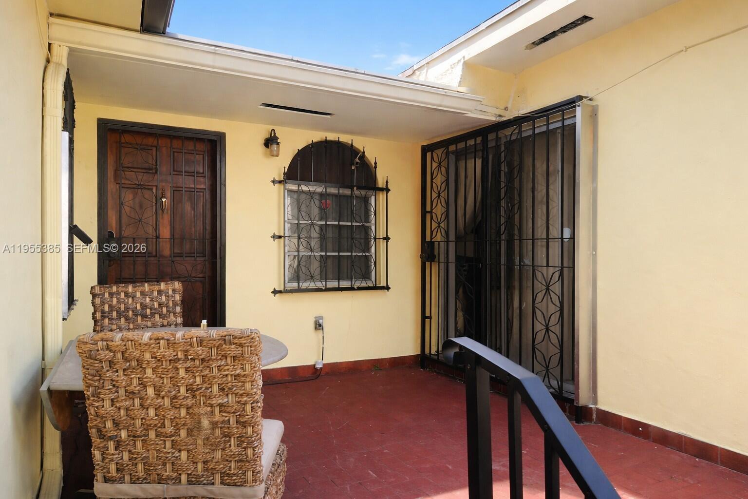 1712 Southwest 13th Street Miami, FL 33145 - Photo 3 of 44 a front view of a house with a large window