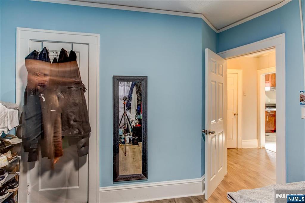 162 Summer Street Orange, NJ 07050 - Photo 15 of 29 a view of a hallway with closet and a window