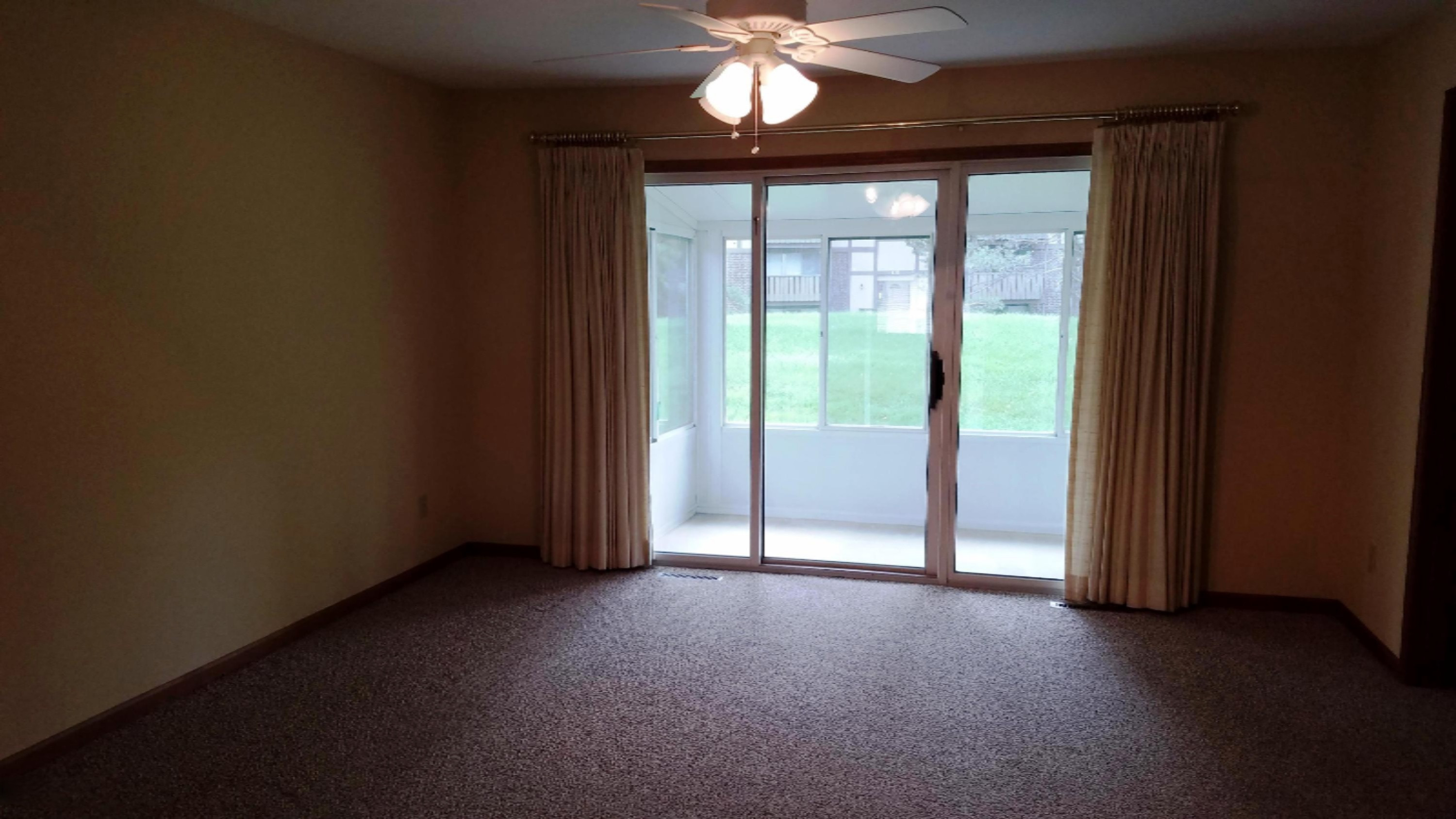5174 Green Meadow Road, Unit 82 Kalamazoo, MI 49009 - Photo 8 of 15 View of living room & slider