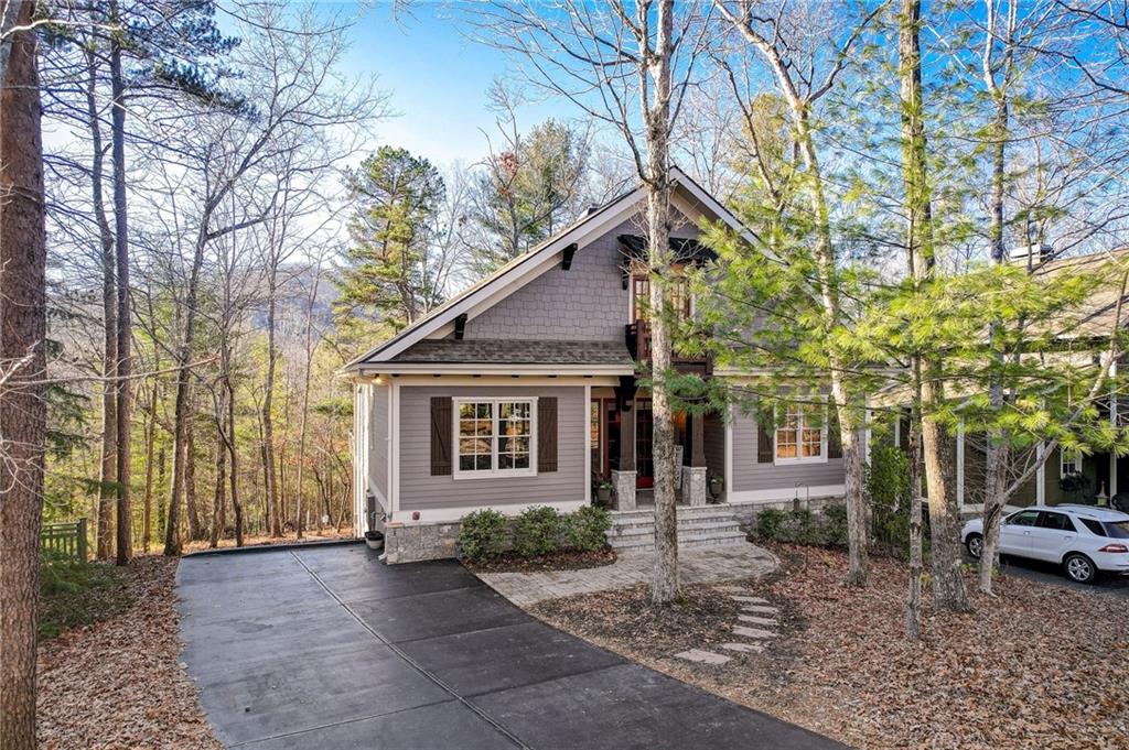 108 Choctaw Ridge Big Canoe, GA 30143 - Photo 1 of 1 a front view of a house with a yard