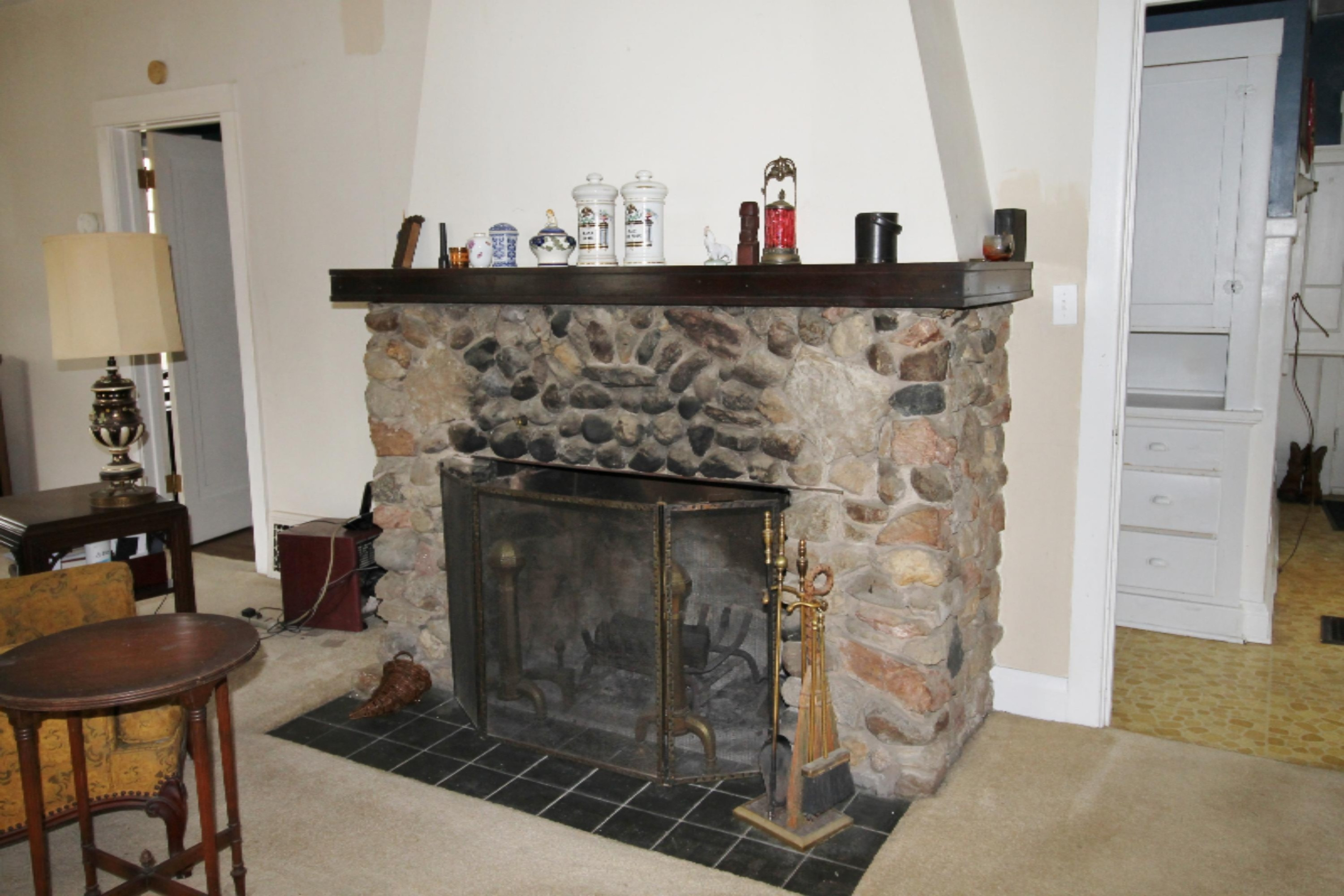 Original stone fireplace in livingroom