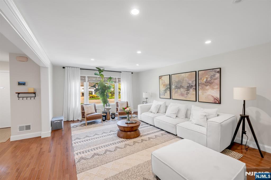 433 Piermont Road Cresskill, NJ 07626 - Photo 7 of 49 a living room with furniture and a large window