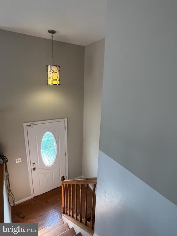 10310 Meadowview Drive Fredericksburg, VA 22408 - Photo 11 of 25 a view of an empty room with wooden floor