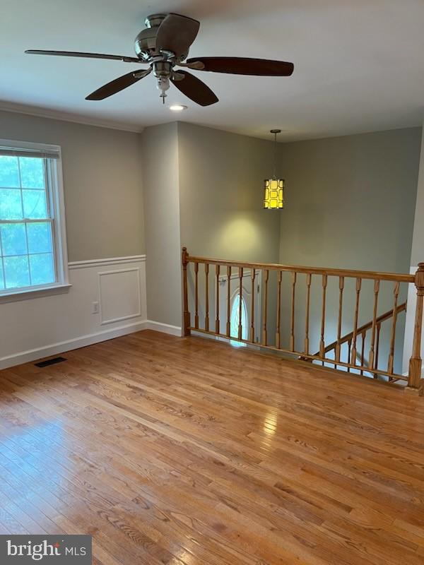 10310 Meadowview Drive Fredericksburg, VA 22408 - Photo 12 of 25 a view of an empty room with wooden floor