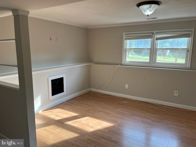 10310 Meadowview Drive Fredericksburg, VA 22408 - Photo 19 of 25 an empty room with windows and fireplace
