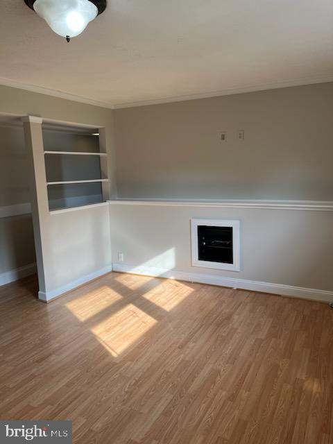 10310 Meadowview Drive Fredericksburg, VA 22408 - Photo 20 of 25 a view of empty room with wooden floor and window