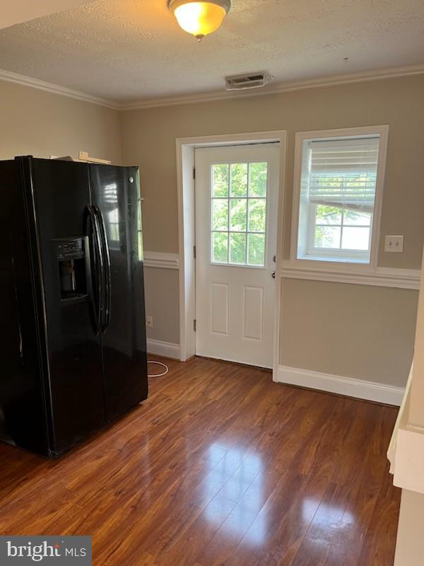 10310 Meadowview Drive Fredericksburg, VA 22408 - Photo 21 of 25 an empty room with wooden floor cabinet and closet