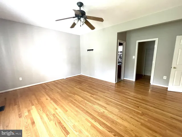 a living room with furniture and fireplace
