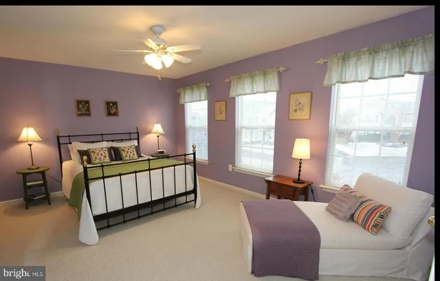 a living room with a couch and a flat screen tv