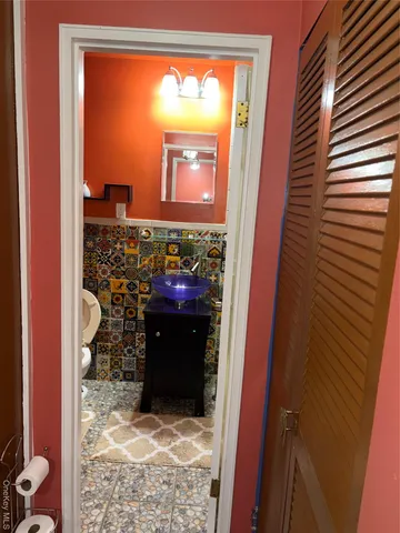 a view of living room with a large window