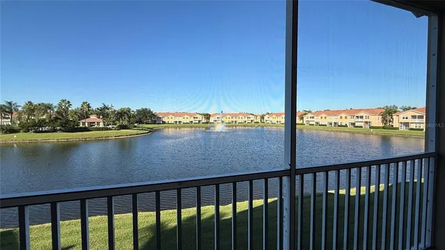 a view of a lake from a balcony