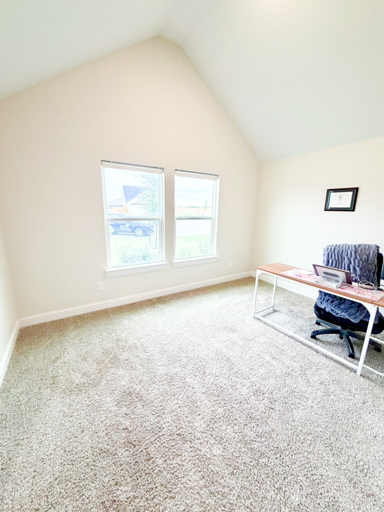 148 Turnrow Cove Somerville, TX 77879 - Photo 13 of 32 an empty room with a window