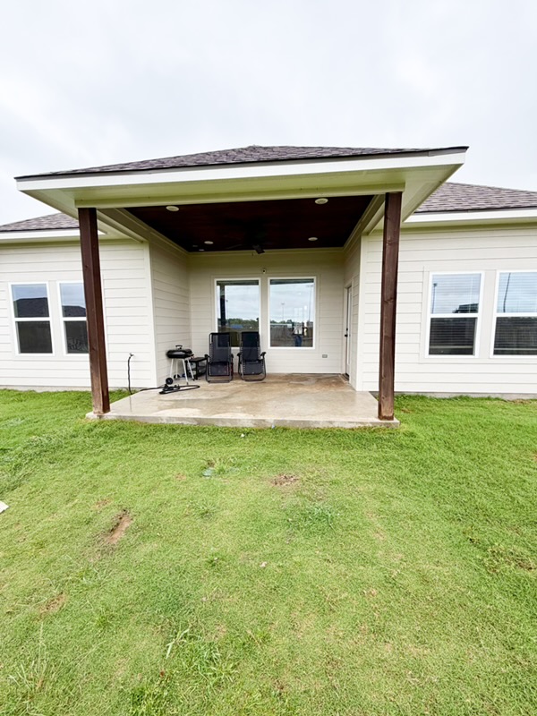 148 Turnrow Cove Somerville, TX 77879 - Photo 32 of 32 a view of a house with a backyard
