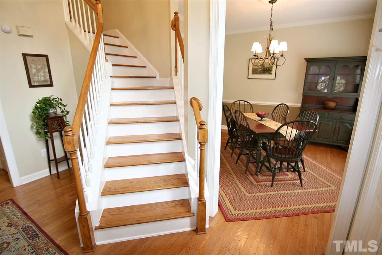 4109 Batiste Road Raleigh, NC 27613 - Photo 3 of 25 a view of entryway and hall with wooden floor
