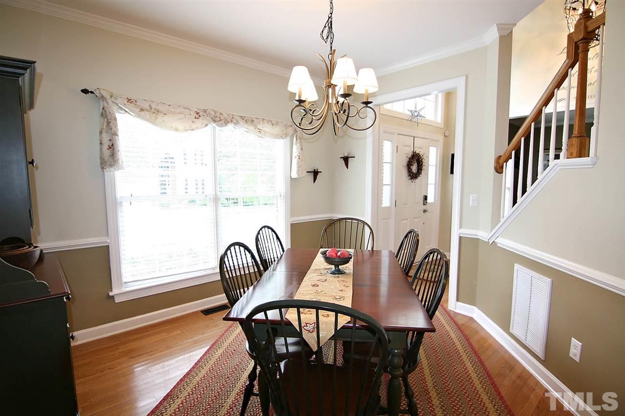 4109 Batiste Road Raleigh, NC 27613 - Photo 7 of 25 a view of a dining room with furniture window and outside view