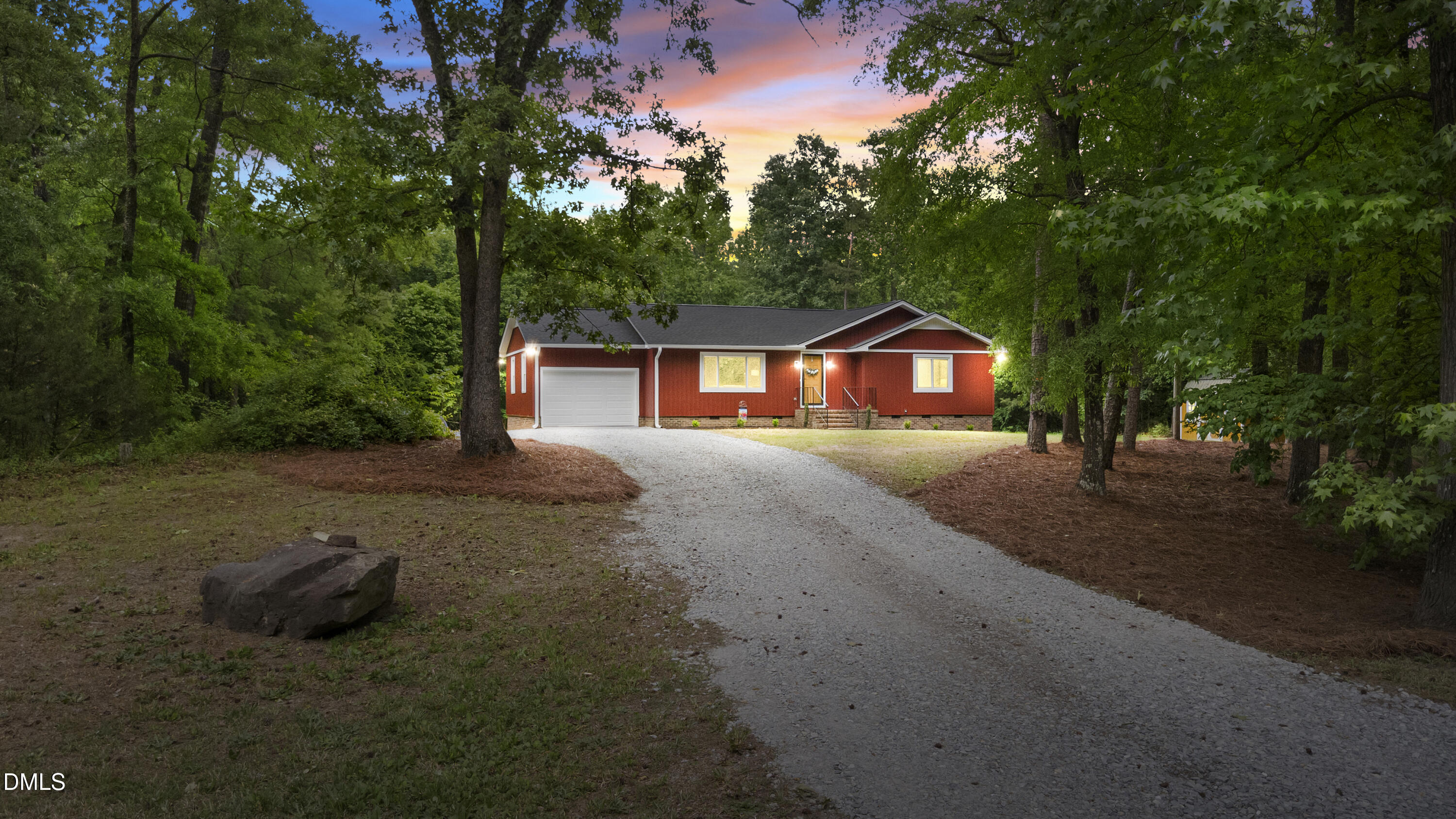 2168 Lakewood Falls Road Goldston, NC 27252 - Photo 1 of 30 a house view with a garden space